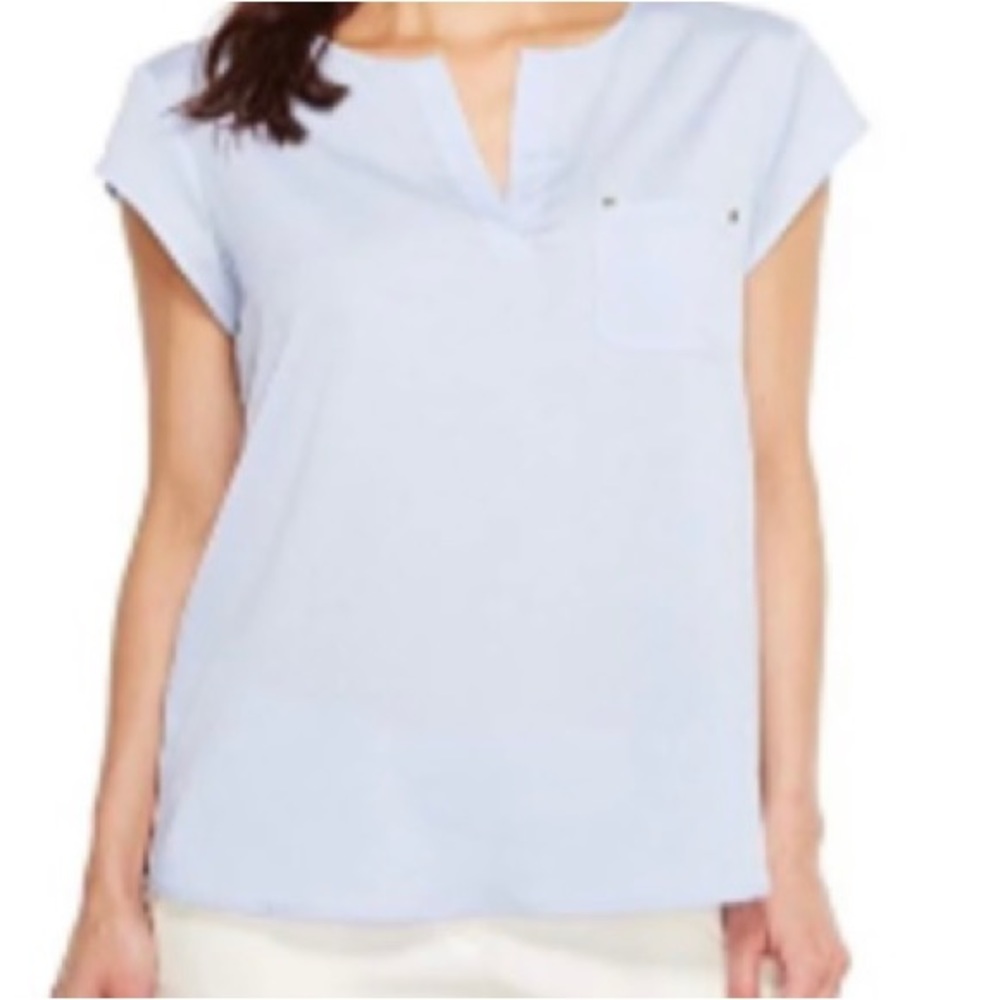IVANKA TRUMP. White cap sleeve blouse. Two gold studs on‎ front pocket.